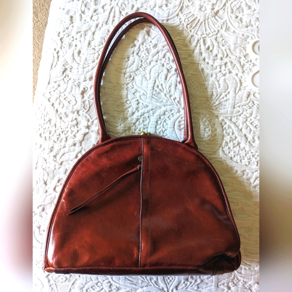 HOBO shoulder bag with button closure